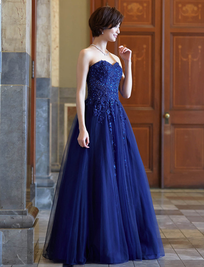 TWEED DRESS(ツイードドレス)のネイビーロングドレス・チュール｜TB1723-NYの全身斜め画像です。