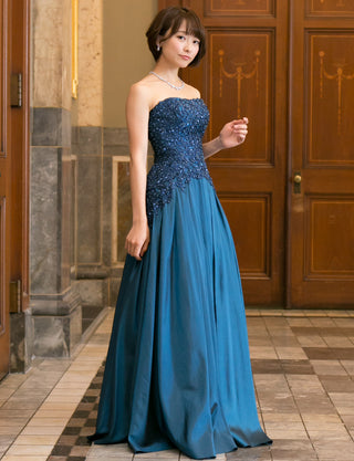 TWEED DRESS(ツイードドレス)のミッドナイトブルーロングドレス・タフタ｜TB1736-MBLの全身斜め画像です。