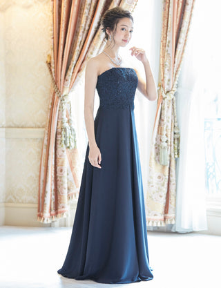 TWEED DRESS(ツイードドレス)のダークネイビーロングドレス・サテン｜TD1830-DNYの全身斜め画像です。