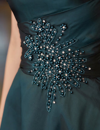 TWEED DRESS(ツイードドレス)のグリーンブラックロングドレス・タフタ｜TH1432-1-GNBKの上半身ウエストビジュ装飾拡大画像です。
