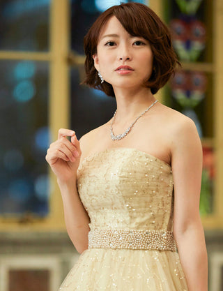 TWEED DRESS(ツイードドレス)のシャンパンゴールドロングドレス・スパンコールチュール｜TH1450-CGDの上半身斜め画像です。