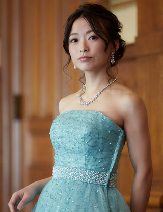 TWEED DRESS(ツイードドレス)のターコイズブルーロングドレス・スパンコールチュール｜TH1450-TQBLの上半身斜め画像です。