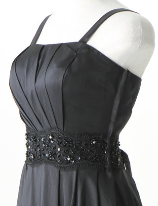 TWEED DRESS(ツイードドレス)のブラックロングドレス・タフタ｜TM1674-BKのトルソー上半身斜め画像です。