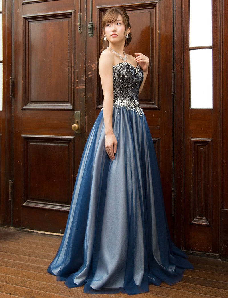 TWEED DRESS(ツイードドレス)のネイビー×シャンパンゴールドロングドレス・チュール｜TM1680-NYの全身斜め画像です。