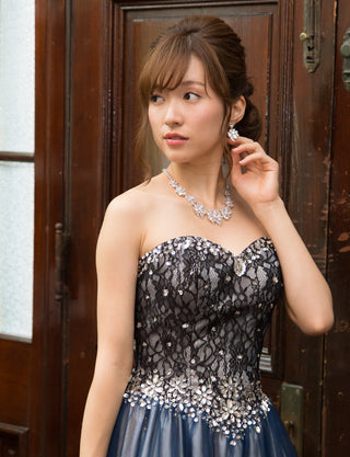 TWEED DRESS(ツイードドレス)のネイビー×シャンパンゴールドロングドレス・チュール｜TM1680-NYの上半身斜め画像です。