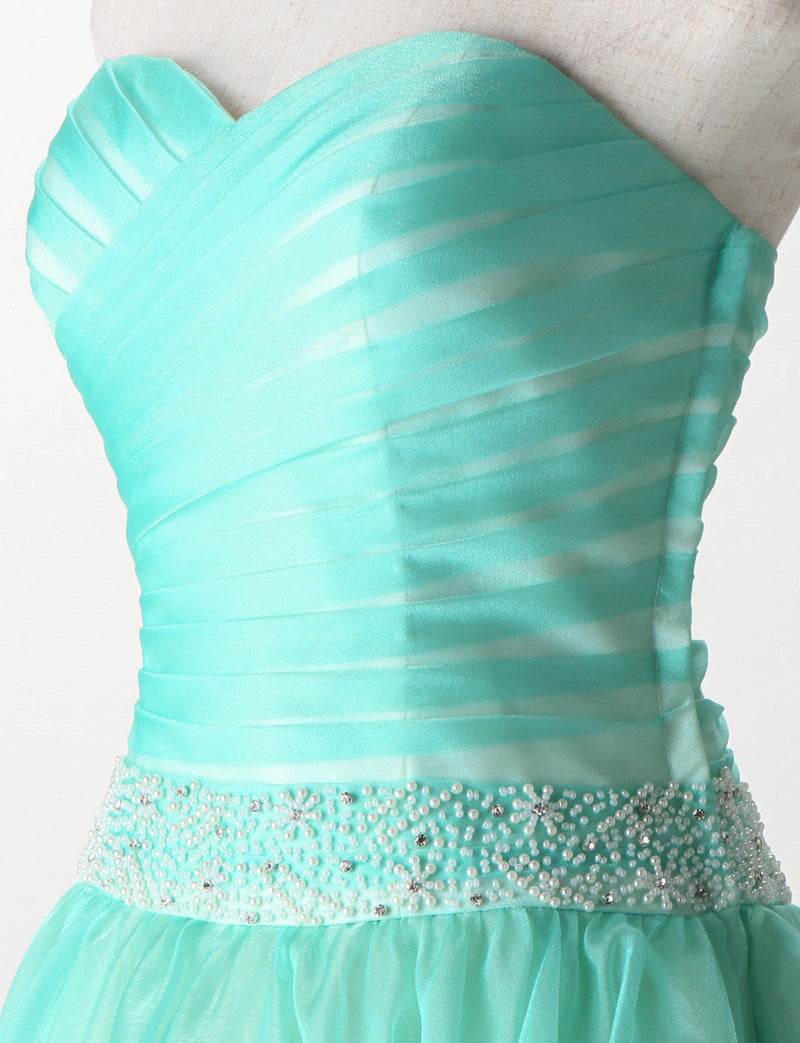 TWEED DRESS(ツイードドレス)のターコイズロングドレス・オーガンジー｜TM1687-TQのトルソー上半身斜め画像です。