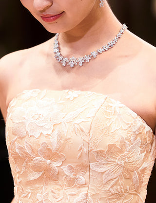 TWEED DRESS(ツイードドレス)のシャンパンゴールドロングドレス・チュール｜TN2020-CGDの上半身装飾拡大画像です。