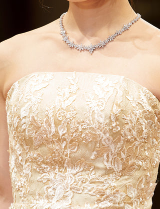 TWEED DRESS(ツイードドレス)のシャンパンゴールドロングドレス・チュール｜TN2024-CGDの上半身装飾拡大画像です。
