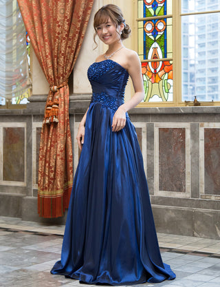 TWEED DRESS(ツイードドレス)のブルーネイビーロングドレス・タフタ｜TS1578-BLNYの全身斜め画像です。
