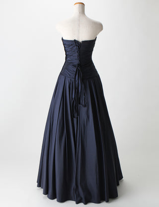 TWEED DRESS(ツイードドレス)のダークネイビーロングドレス・タフタ｜TS1578-DNYのトルソー全身背面画像です。