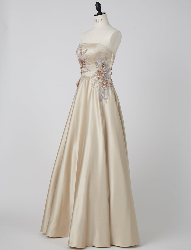 TWEED DRESS(ツイードドレス)のシャンパンゴールドロングドレス・サテン｜TW1914-CGDのトルソー全身斜め画像です。