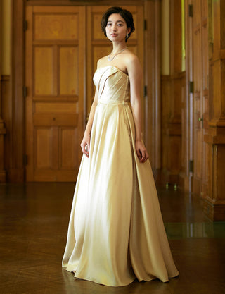 TWEED DRESS(ツイードドレス)のゴールドロングドレス・サテン｜TW1922-GDの全身斜め画像です。